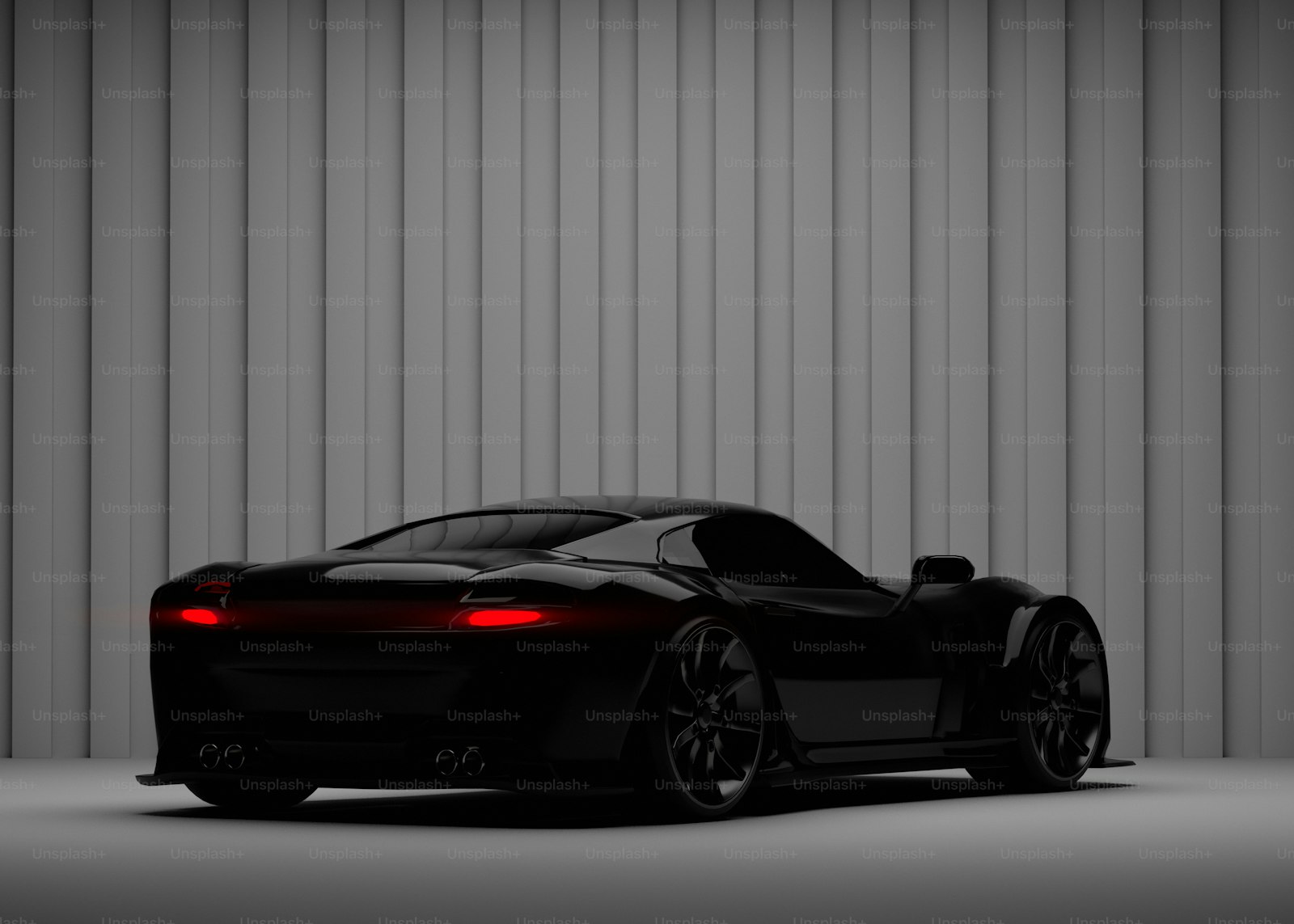 Aston Martin in a dark studio